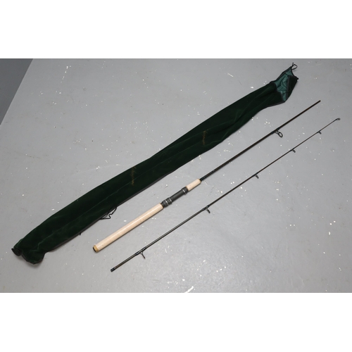 734 - A Shakespeare Quadra Two Piece Carbon Spin Rod, 2.4m. In Bag