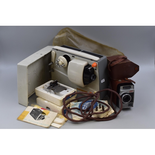 704 - A Selection of 8mm Film Items To Include Pentax P80 Projector (Powers On), Kodak 8 Movie Camera, And... 