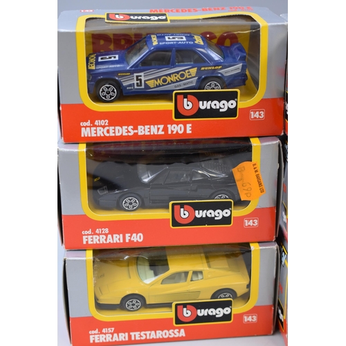 822 - 6 Burago die-cast model cars including a Ferrari f40, Mercedes Benz 190, Peugeot 205 safari, Porsche... 