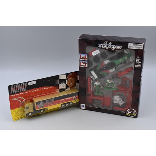 829 - Two Formula One Collectors Di-Cast Vehiclesto include a Michael Schumacher Truck and a Pit Stop Raci... 