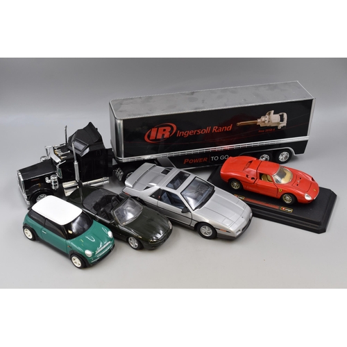 848 - Collection of die-cast models, including a Pontiac Fiero GT, Mini Cooper, Ferrari LeMans 250, Jaguar... 