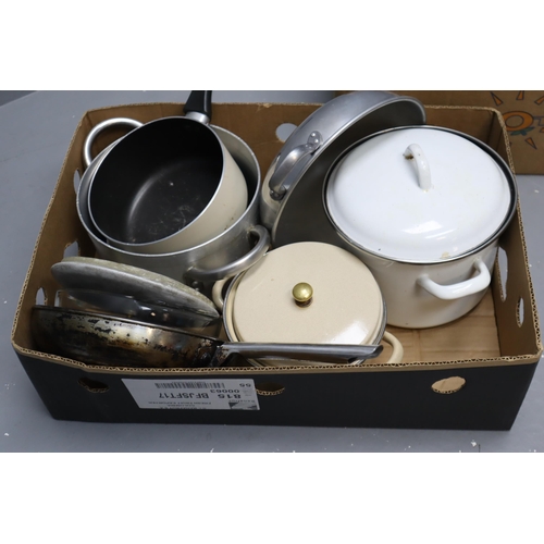 917 - Two boxes full of kitchen items to include saucepans, pans and more