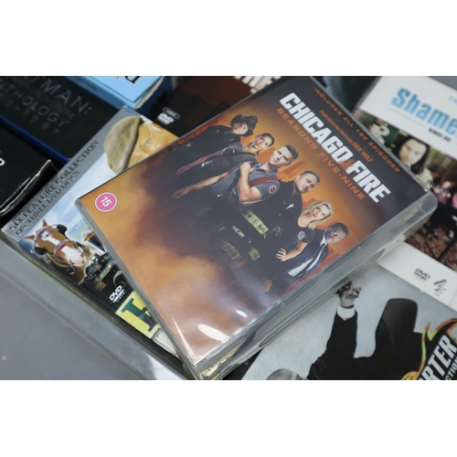 890 - Box full of DVDs to include Idris Elba Luther series 1 & 2, Shameless series 1-5, Shameless seri... 