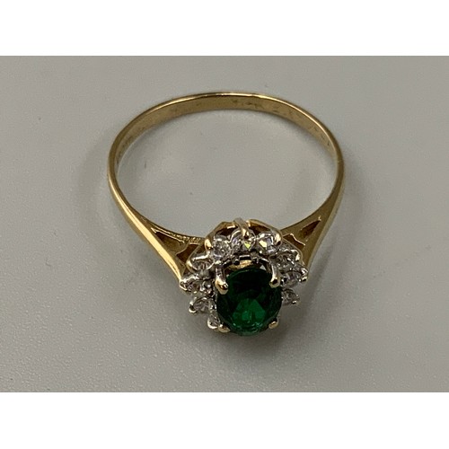 28 - Hallmarked Birmingham 375 (9ct) Clear and Green Stoned Ring (Size P) Complete with Presentation Box