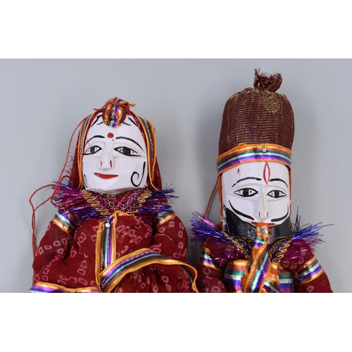 282 - Two handpainted Rajasthani puppets in wood and cloth