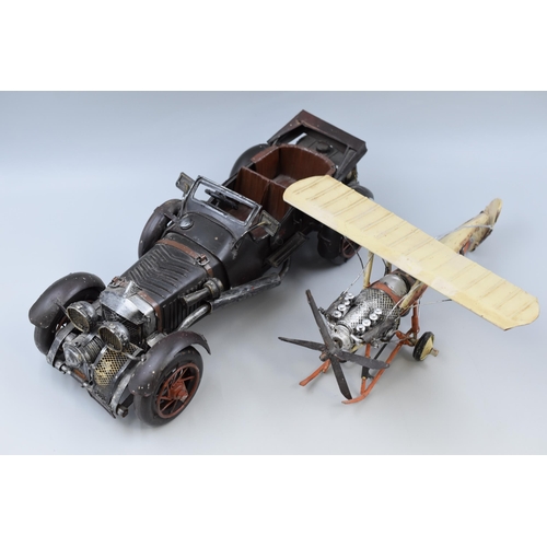 326 - Large tin plate model of a motor car and aeroplane (biggest L 15