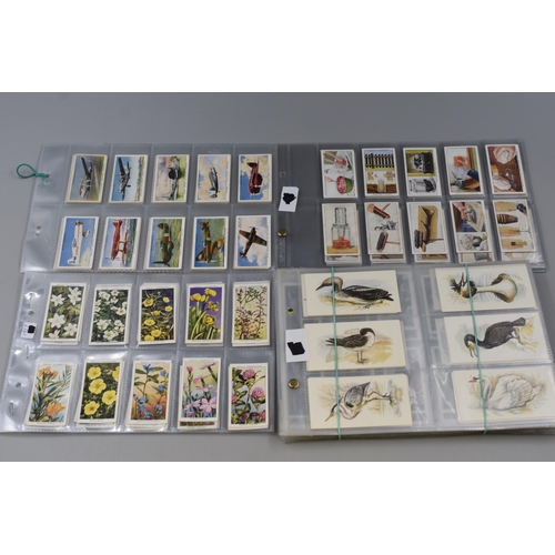 185 - Eleven full sets Wills cigarette cards in sleeves