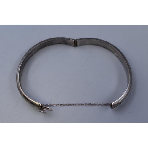 62 - Hallmarked Birmingham Silver Bangle complete with Safety Chain