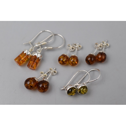 75 - Five Pairs of Silver 925 Amber Earrings