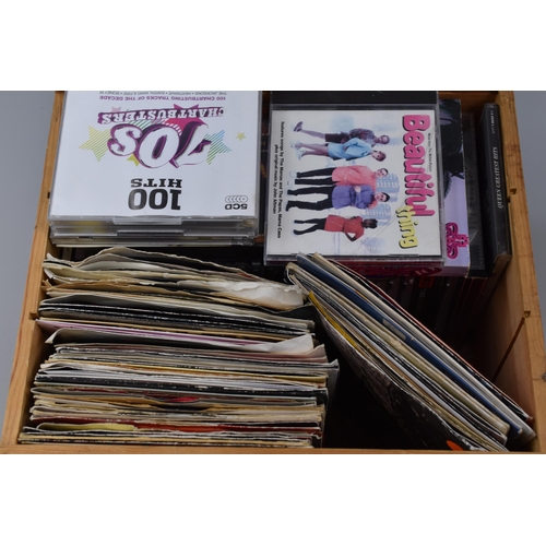 454 - Mixed lot of Single Records and Cd's of Various Artist from Various Years