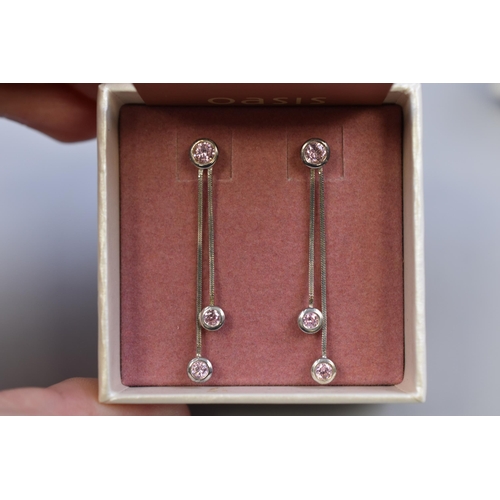 84 - Three Pairs of Pink Stoned Dangly Earrings in Presentation Boxes