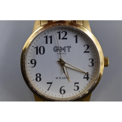 113 - A GMT London Gold Tone Gents Quartz Watch, Working