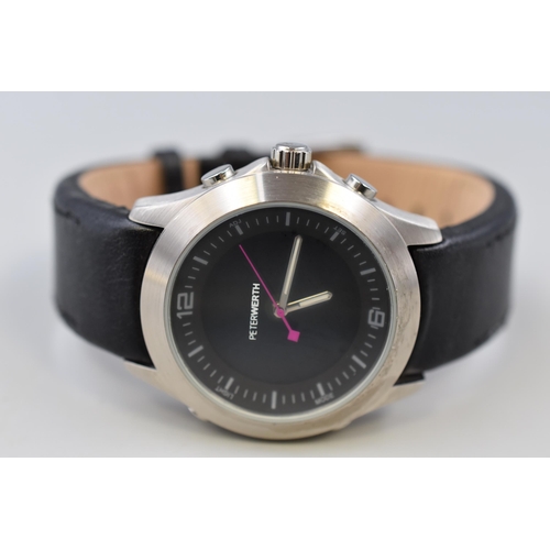 124 - A Gent's Peter Werth Analogue/Digital Watch, With Leather Strap