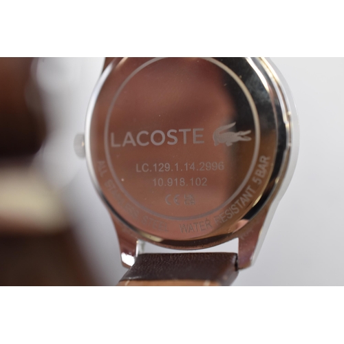 127 - A Lacoste Gent's Quartz Vienna Watch, With Leather Strap. Working