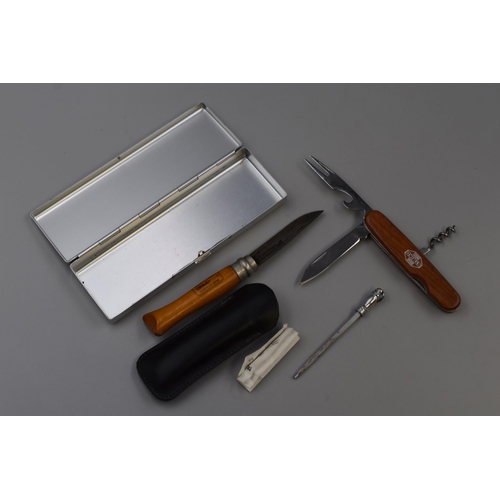 238 - Two Quality Pocket Knives to include a French Opinel complete with Sharpener and a Multi-Bladed Stri... 