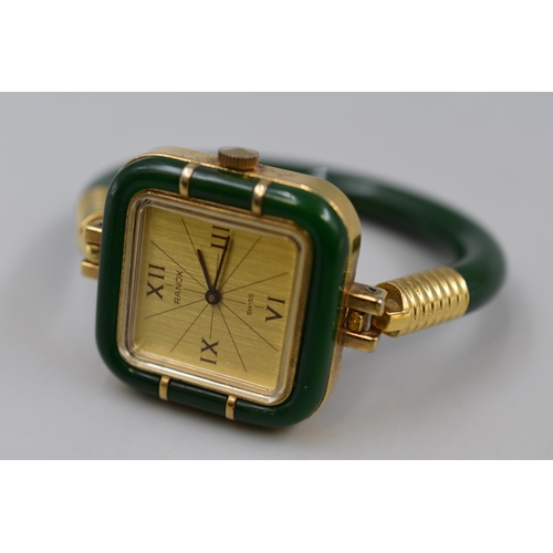 146 - A Ranox Swiss Mechanical Ladies Watch, In Gold Tone and Jade Effect. Working