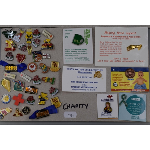 251 - Selection of Charity pin badges to include Lifeboat, Macmillan, Red cross and more