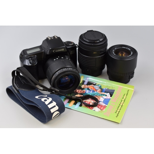 395 - A Canon EOS 1000F SLR Camera, With Strap and Three Lenses (Sigma UC APO 70-210mm, Sigma UC Zoom 28-7... 