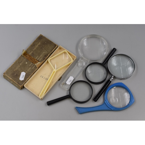 397 - Selection of six magnifying glasses to include a vintage one