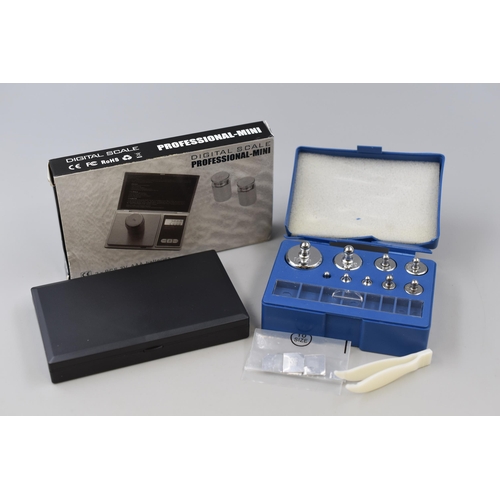 399 - A Set of Digital Pocket Scales With an Eighteen Piece Weight Calibration Set