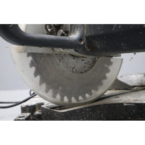 413 - A Wickes 2000W Sliding Mitre Saw, Powers On When Tested But Requires Attention