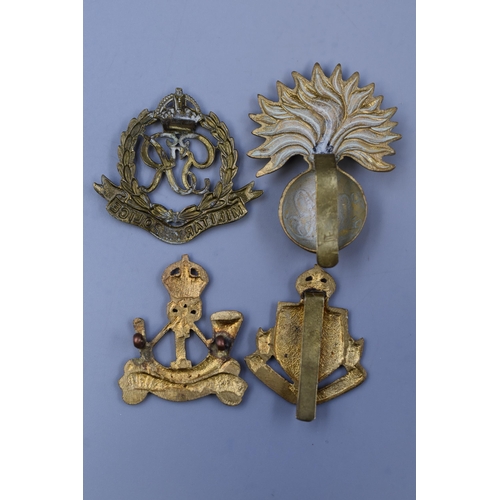 272 - Four Military Cap Badges including Honourable Artillery Company, Kings African Rifles, Cyprus Regime... 