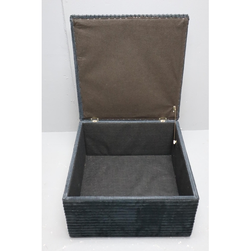 567 - A Contemporary Black Velour Covered Footstool With Storage. Approx 25.5