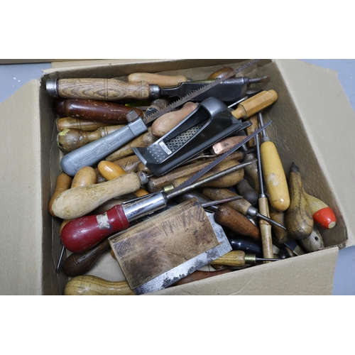 632 - Three boxes of vintage tools to include chizzles, tape measures, nutdriver and more