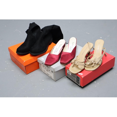 646 - Three pairs of shoes to include over the knee boots (size 5), slim heel sandles (size 5) and satin 2... 