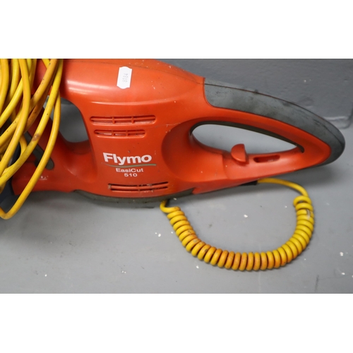 614 - Flymo EasiCut 510 hedge trimmer, blades require some oil (working when tesed)