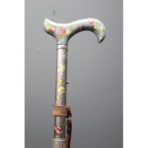 615 - Five adjustable walking sticks (all different patterns)