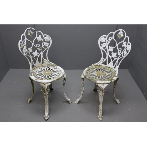 539 - A Pair of Cast Metal Garden Chairs, Depicting Grape Vines. Approx 34.5