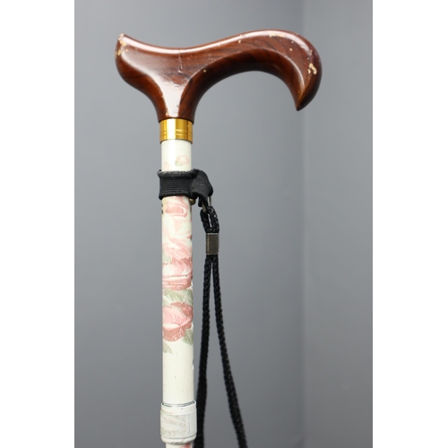 615 - Five adjustable walking sticks (all different patterns)