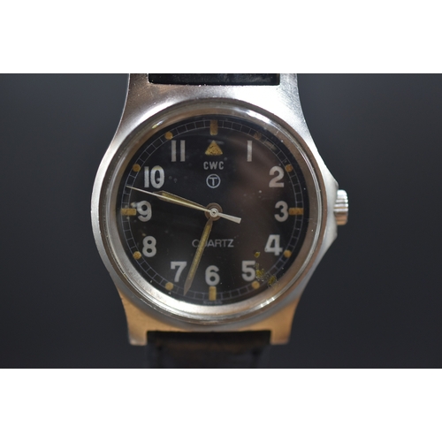 1 - A Cabot Watch Company (CWC) British Military Issue Quartz Watch With Black Dial and Leather Strap. N... 