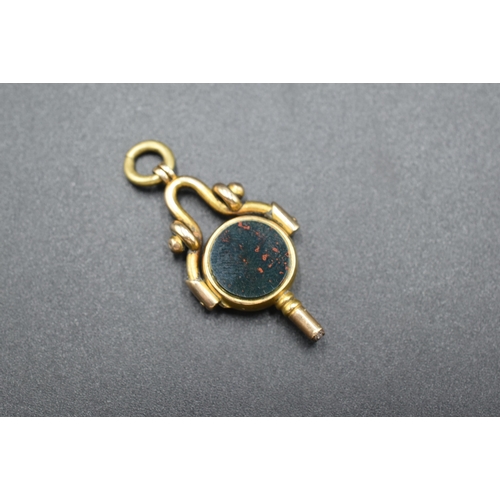 10 - A Hallmarked 18/10ct Gold Reversible Pocket Watch Key Charm