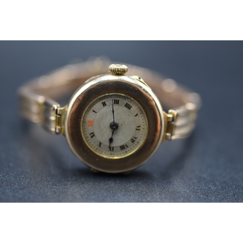 A 9ct Gold Cased Nirvana Ladies Watch, With Adjustable 'English Made 9ct' Strap.