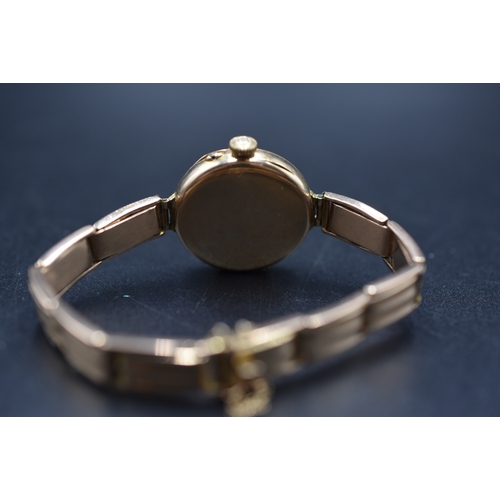 8 - A 9ct Gold Cased Nirvana Ladies Watch, With Adjustable 'English Made 9ct' Strap.