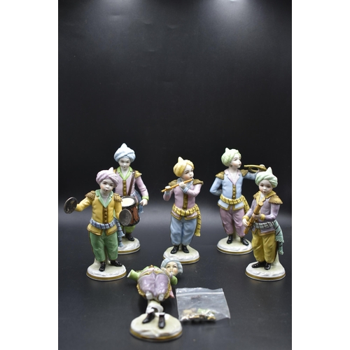 17 - Set of six Sitzendorf porcelain Turkish child band figures, each with blue factory mark to the under... 