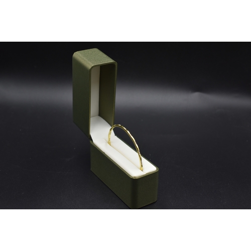 24 - Gold 750 (18ct) .50ct Diamond Bangle Complete with Presentation Box (60cm Dia) weight 10.80 grams