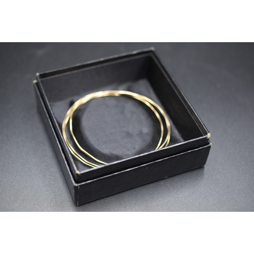 26 - Gold 375 (9ct) Bangle Set x3 Complete with Presentation Box (Dia 6.5mm) Weight is 7.58 grams