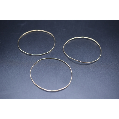 26 - Gold 375 (9ct) Bangle Set x3 Complete with Presentation Box (Dia 6.5mm) Weight is 7.58 grams