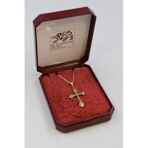 15 - A 9ct Gold Cross Pendant, on 9ct Gold Chain