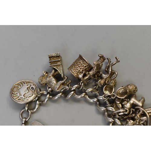 28 - Silver 925 Bracelet with 22 Silver Charms