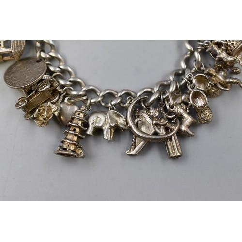 28 - Silver 925 Bracelet with 22 Silver Charms