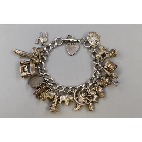 28 - Silver 925 Bracelet with 22 Silver Charms