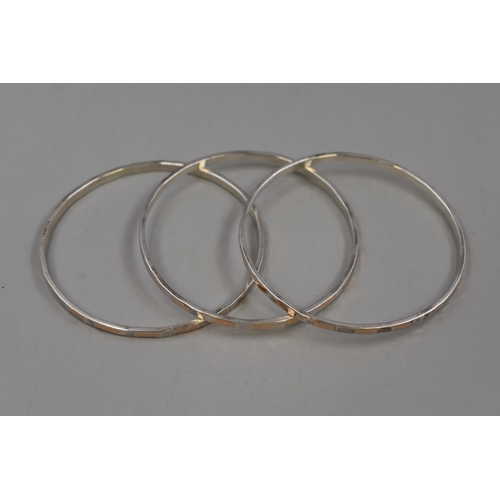 56 - Three Matching Silver 925 Bangles with 9ct Gold Inlay