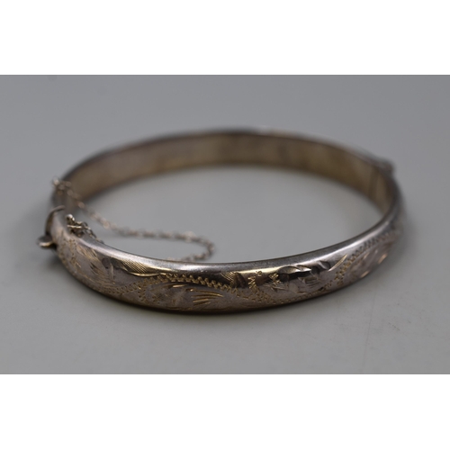 57 - Hallmarked Birmingham Silver Etched Bangle complete with Safety Chain