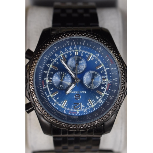 112 - An Enzo Giomani Gent's Black Metal Blue Face Chronograph Watch, In Presentation Box. Working