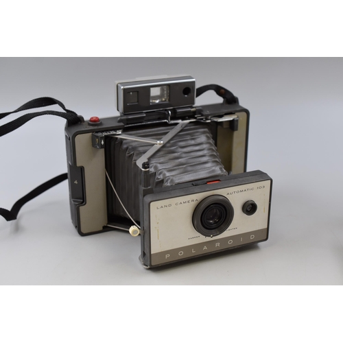 534 - A Polaroid Automatic 103 Land Camera, With A Selection of Vintage Camera Accessories To Include Sunp... 