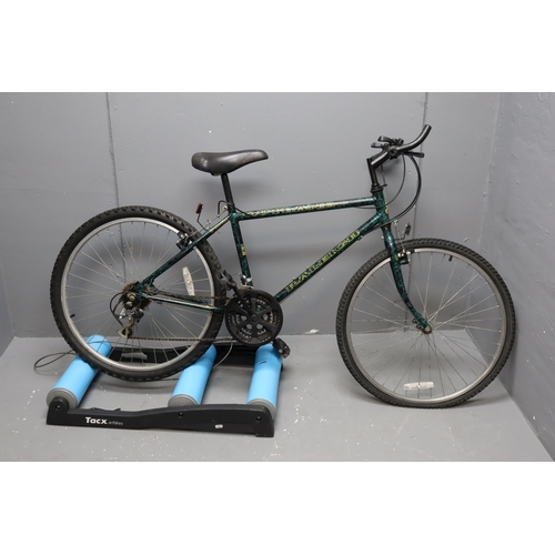 654 - A Raleigh Outland 18 Speed Mountain Bike (Requires Attention), With Tacx Antares Bike Roller. No Pos... 